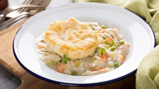 Individual chicken pot pie plate with a biscuit on top